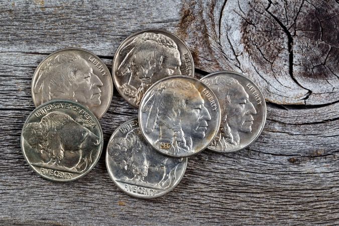 Vintage American Coins on Rustic Wood
