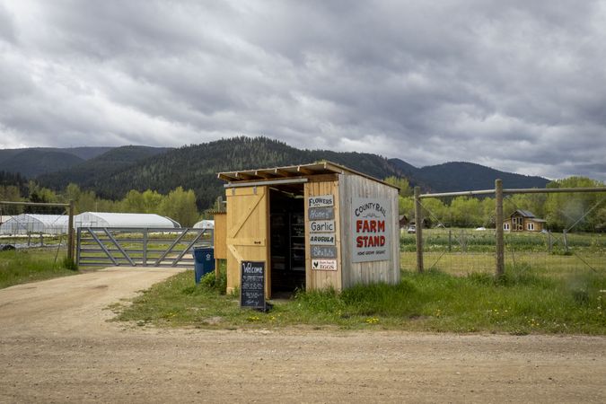 Farm stand in the Rocky Mountains with mountains in the background
