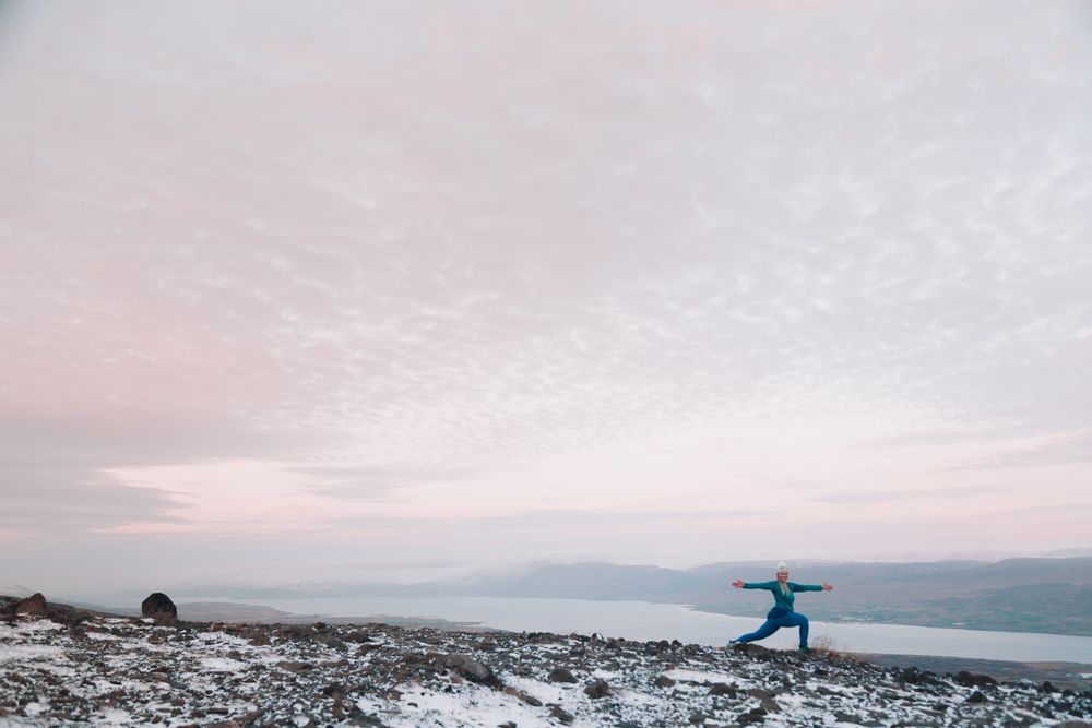 Woman posing on hill in snow