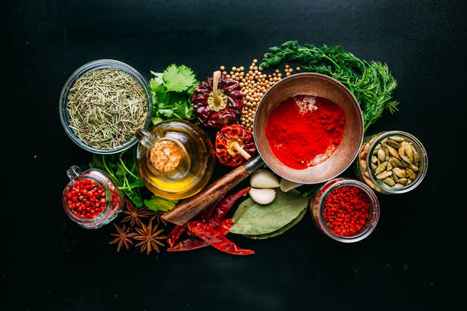 Assorted spices near fresh oil