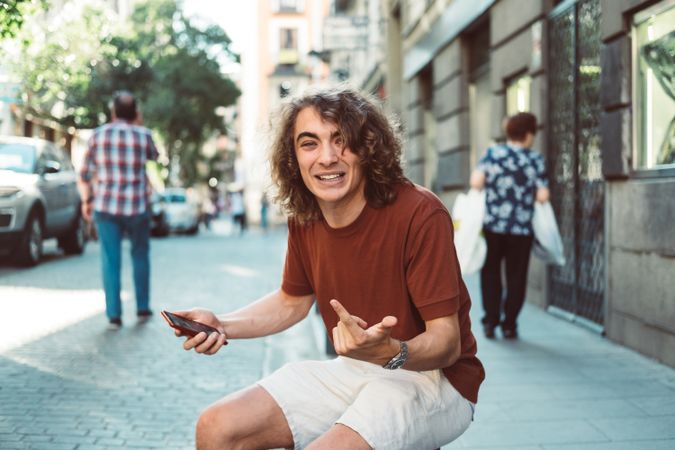 Man on the mobile phone on the street