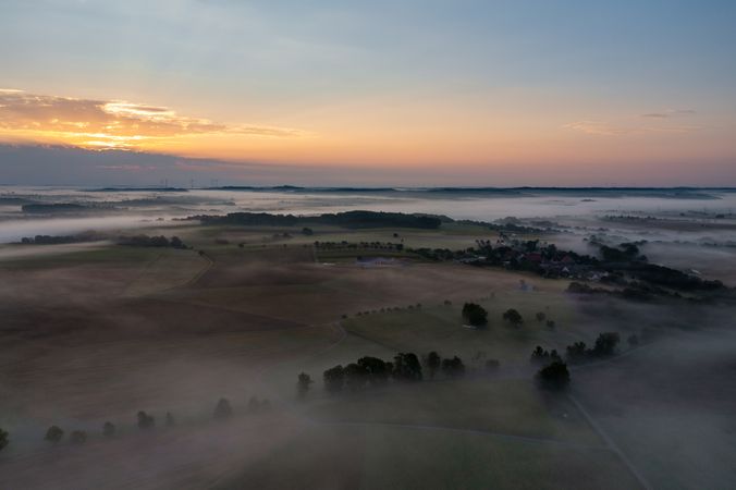 Drone aerial view of a foggy morning in the german village