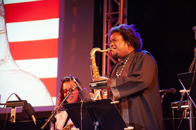 Los Angeles, CA, USA - July 12, 2012: Kamasi Washington playing saxophone on stage