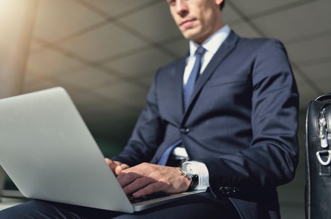 Professional man working on a laptop