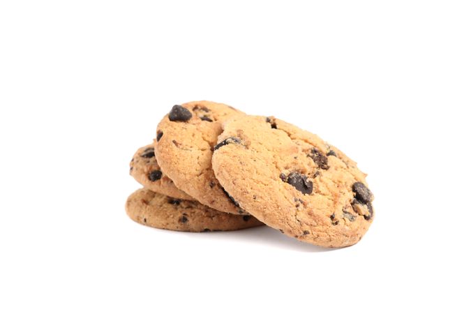Tasty chocolate chip cookies isolated on plain background. Sweet biscuits