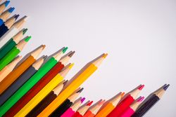 A row of pencils with one pencil standing out
