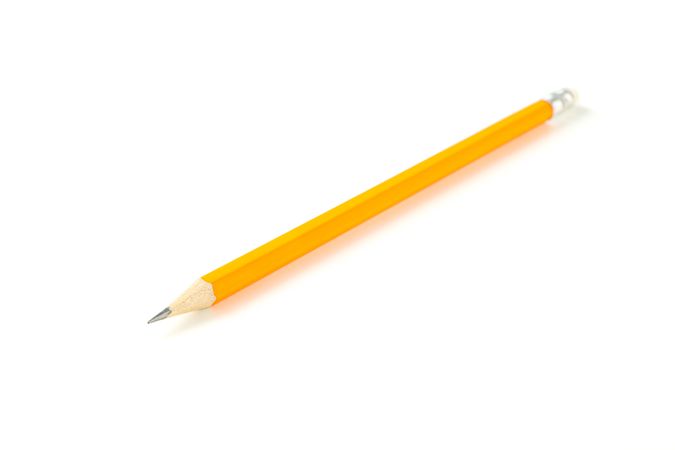 Pencil isolated on studio background, closeup. Stationery