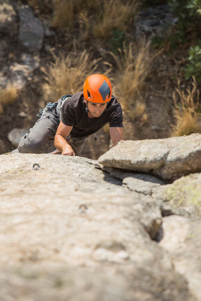 Man climbing a rock