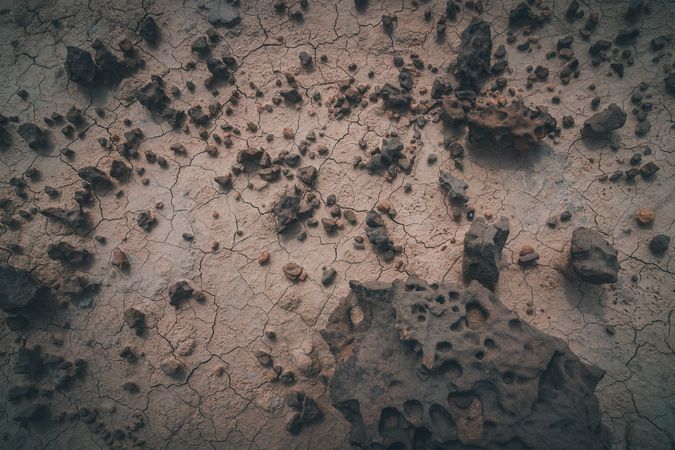 Dry desert cracked area with stony elements