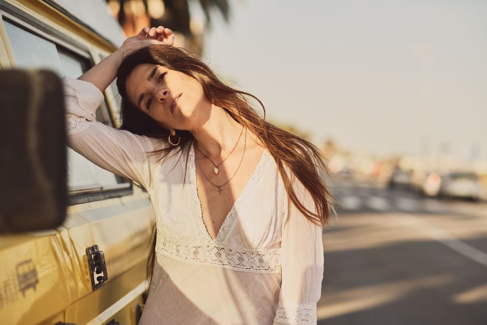 Young woman on a yellow van