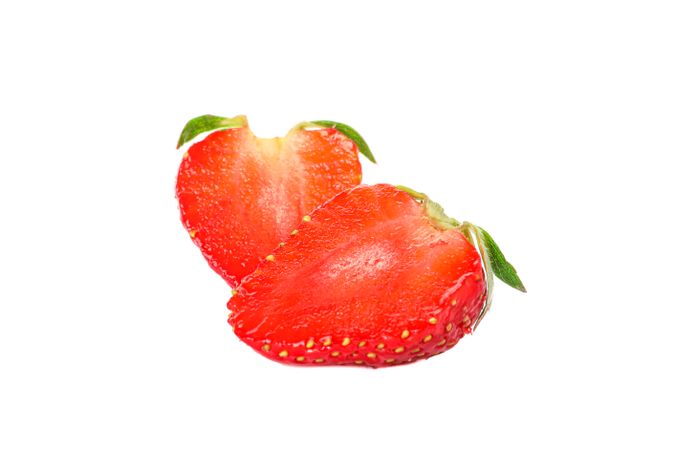 Strawberries isolated on light background. Summer sweet fruits and berries