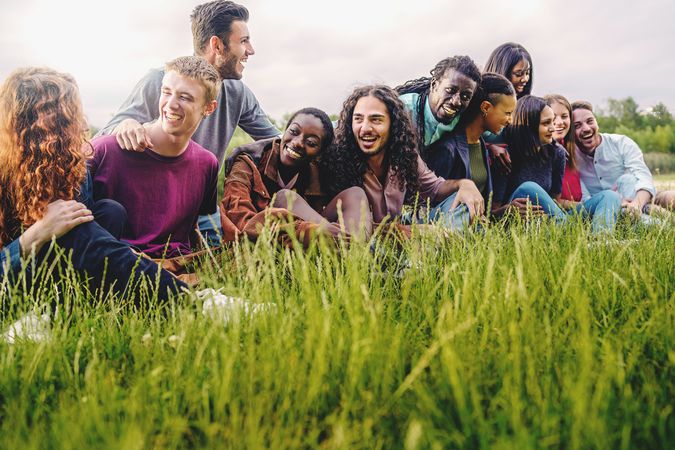 Diverse people hanging out in the park