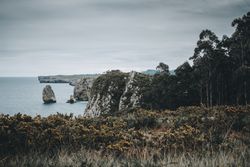Deserted cliffs and cloudy sky