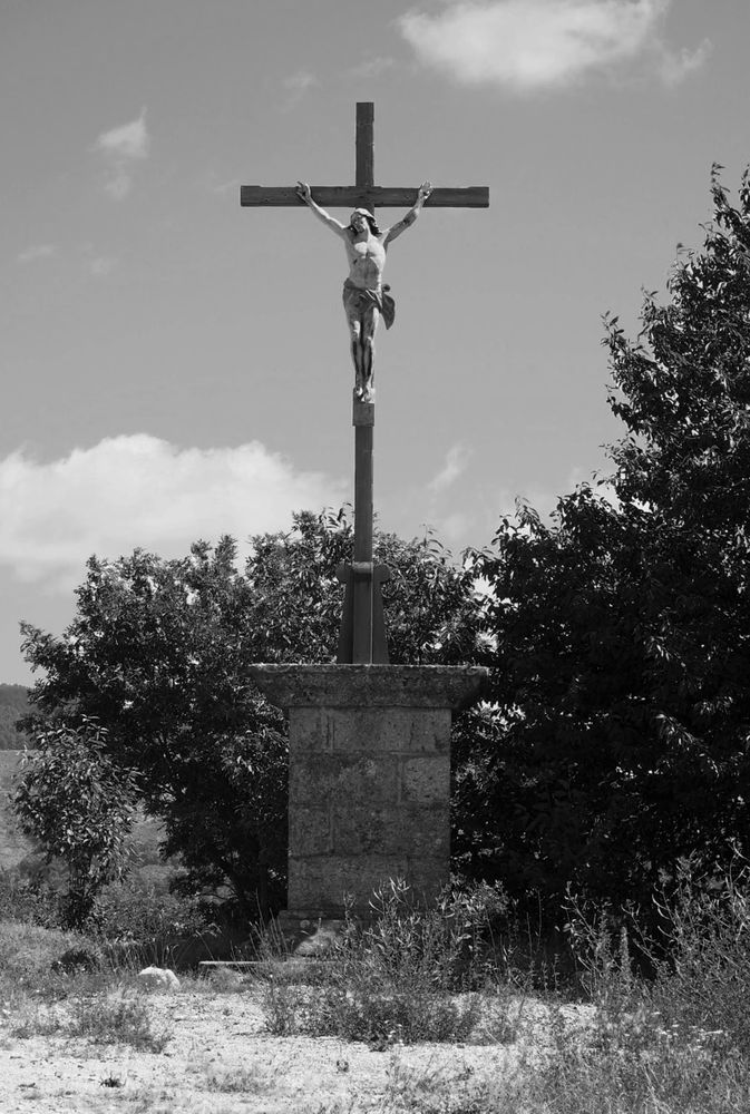 Faithful Journey: B&W Christian Cross by the Roadside