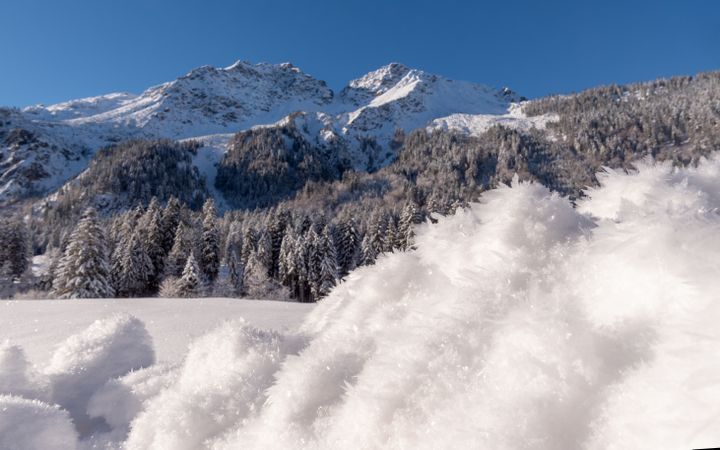 Snowy scenery on a sunny day in the Bavarian Alps, in Oberstdorf, Germany