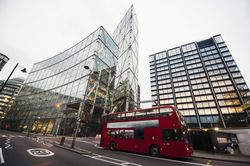 Red bus on city street