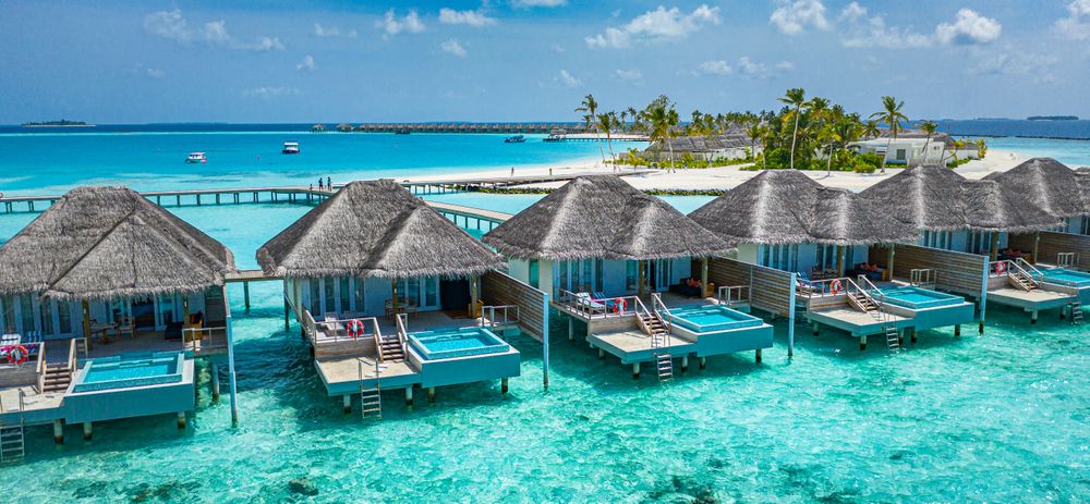 Back patios of holiday villas on tropical beach resort
