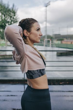 Woman doing arm stretches
