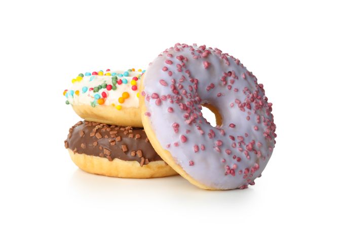 Tasty baked donuts isolated on plain background