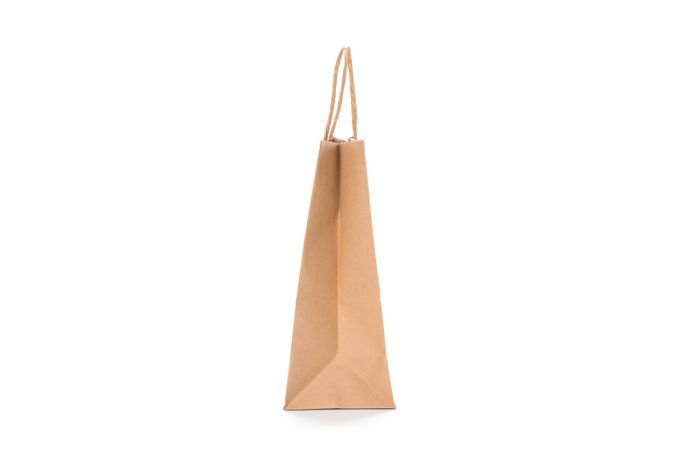 Empty paper bag isolated on blank background