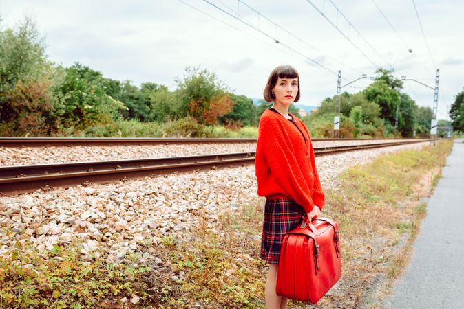 Woman standing at the train station