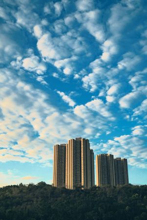 Blue sky over city buildings