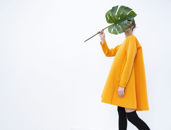 Woman Holding Large Flower