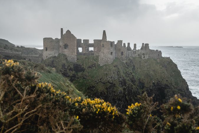 Ruins of medieval castle on cliff in Northern Ireland