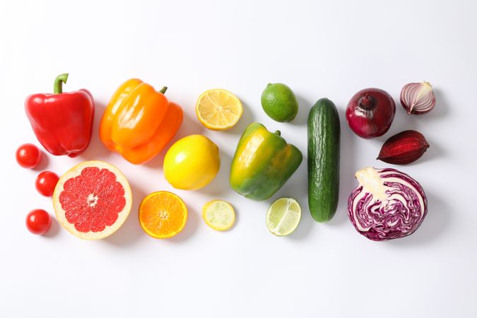 Flat lay with vegetables and fruits on plain background, copy space