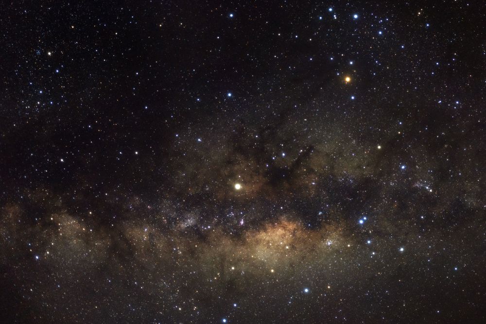 Milky way galaxy with stars and space dust in the universe, Long exposure photograph, with grain.