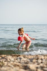 Young girl on beach shore