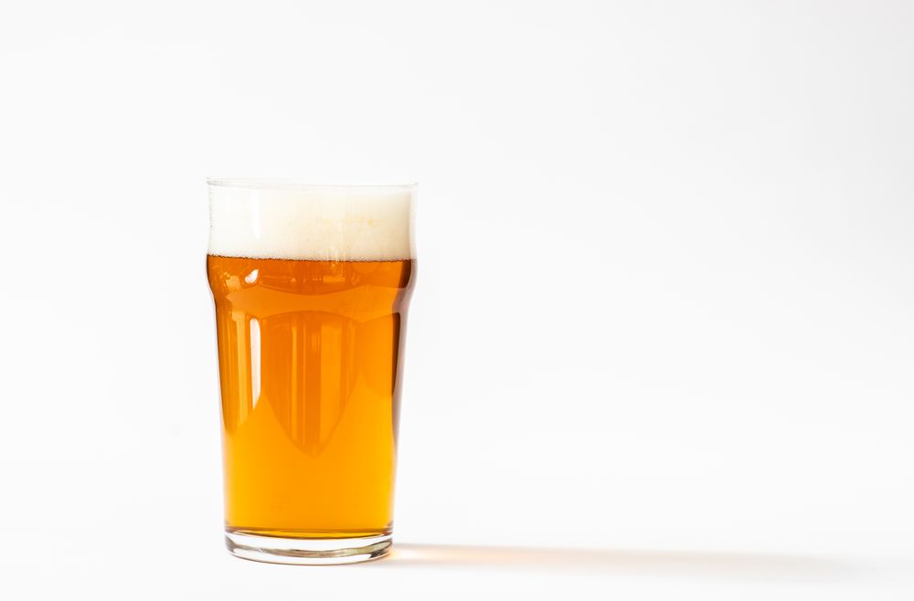 Glass of craft beer in studio setting