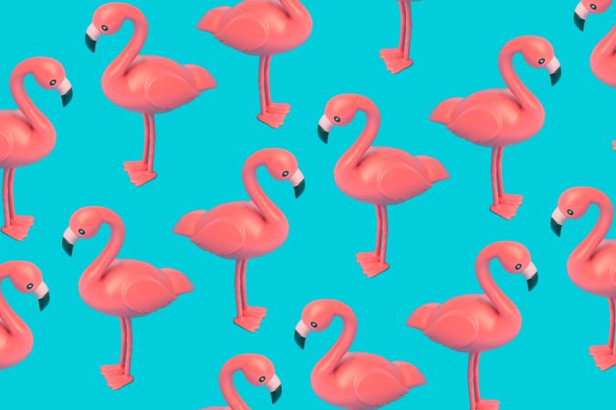 Pink flamingo pattern on blue background