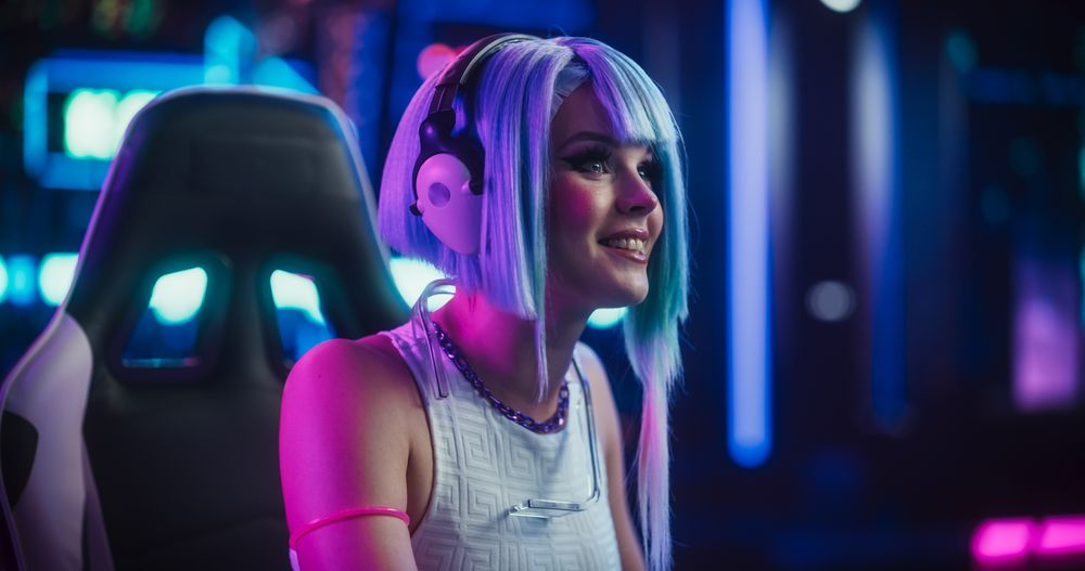 Stylish Streamer or Video Gamer Chatting with Internet Fans in Futuristic Cyberpunk Studio