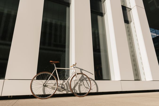 Bicycle parked outside modern building