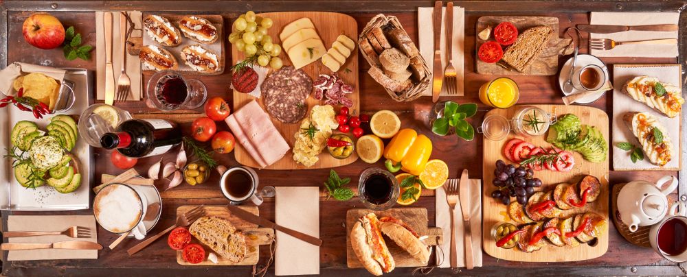 Assorted appetizers on wooden table
