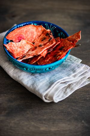 Bowl of thin slices of dried watermelon