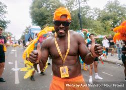 London, England, United Kingdom - August 28, 2022: Muscular man on street at Notting Hill Carnival 0PdGm0