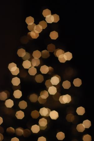 Dark background and gold bokeh lights