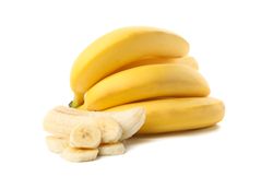 Banana cluster isolated on light background. Fresh fruit