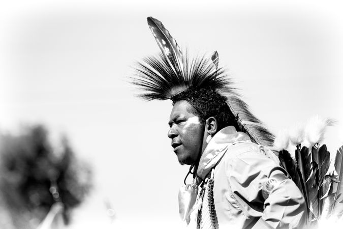 Red Wing, MN, USA - September 22nd, 2017: Profile of Native American man in headdress