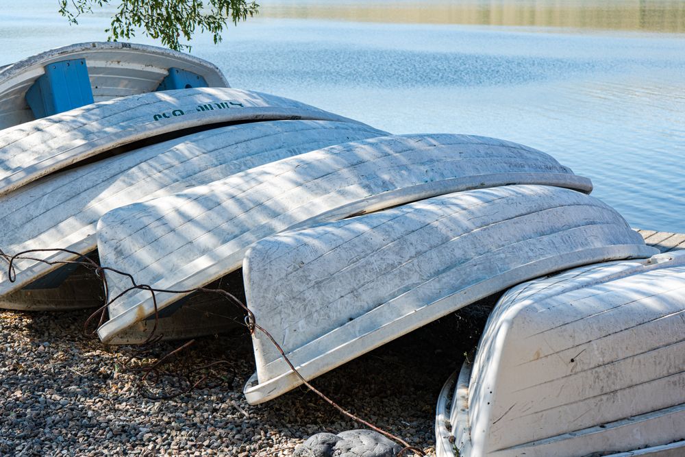Old boats on the lake bank