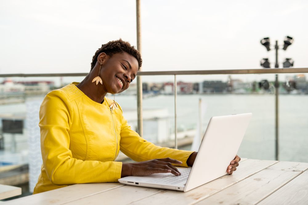 Female working on laptop at table