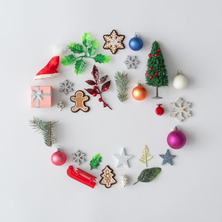 Flat lay of Christmas cookies and decorations in circle
