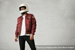Man in dark red leather jacket and biker helmet 5RoRW4