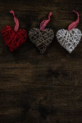 Valentine's day concept with three thatched heart decorations