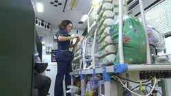 A female nurse amongst engineering equipment