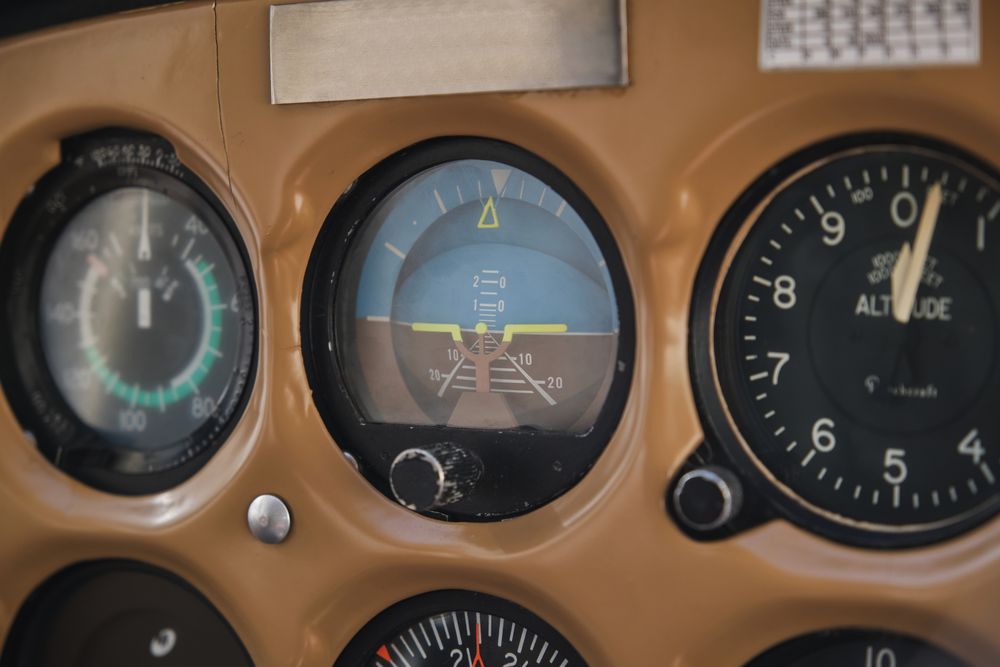 Control panel with round dashboard in airplane