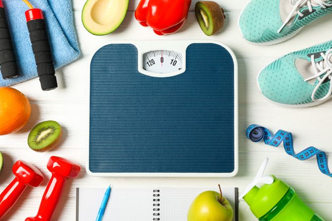 Flat lay composition with loss weigh accessories on blank wooden background