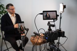 Camera Recording Blogger Interview